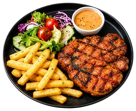 Grilled ribeye plate with fries and salad